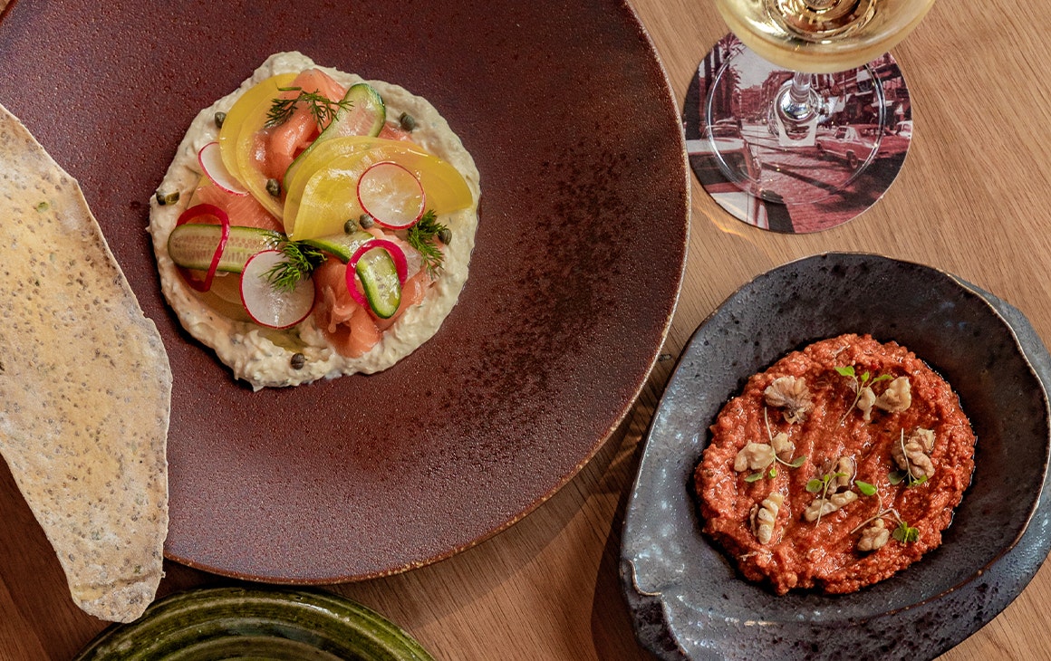 aseveral plates of middle eastern food